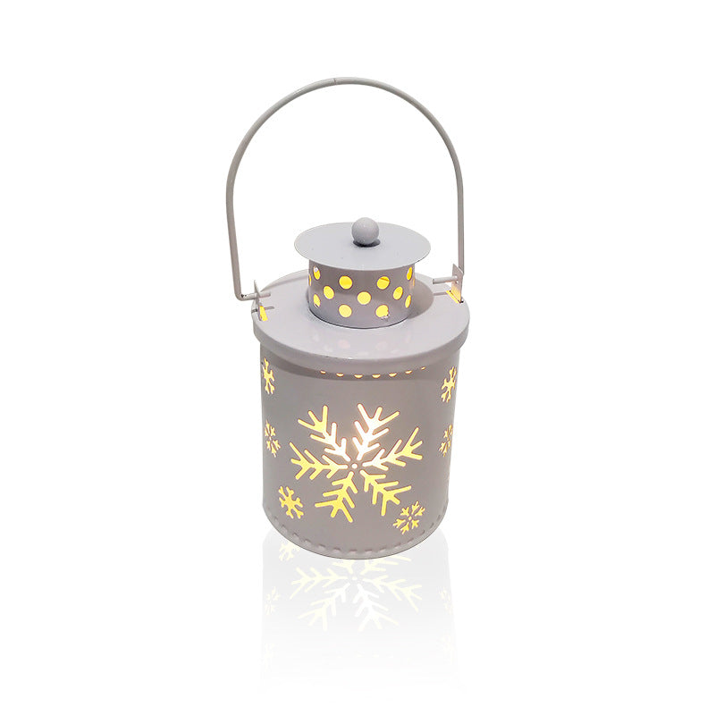 LED Christmas candle lantern with snowflake design, creating a warm holiday ambiance.