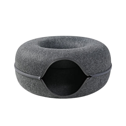 Two playful cats interacting with a 2-in-1 felt cat tunnel bed in stylish grey felt.