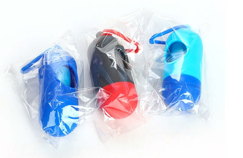 Pet Trash Bag Dog Poop Bags For Waste Refuse Cleanup in blue, gray, and teal packaging.