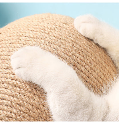 Sisal vertical cat toy featuring a cat playing with a round sisal ball on a wooden stand, promoting feline activity.