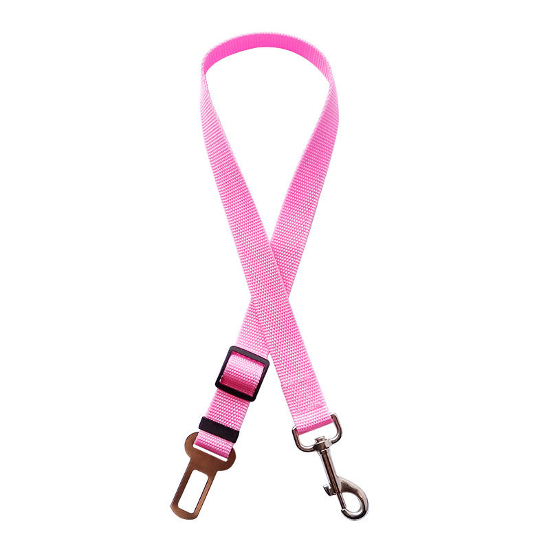 Golden retriever in adjustable pet safety seat belt attached to car seat for secure travel.