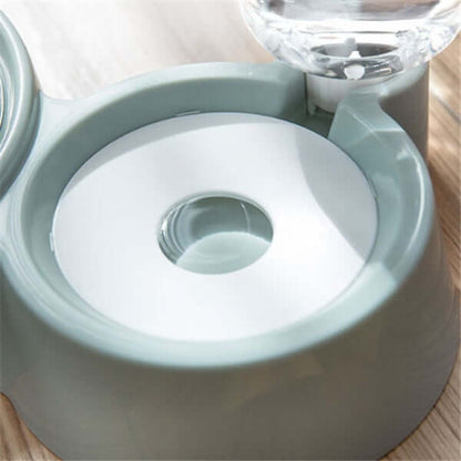 Close-up of the inside of an automatic dog water bowl showcasing the water refill mechanism.