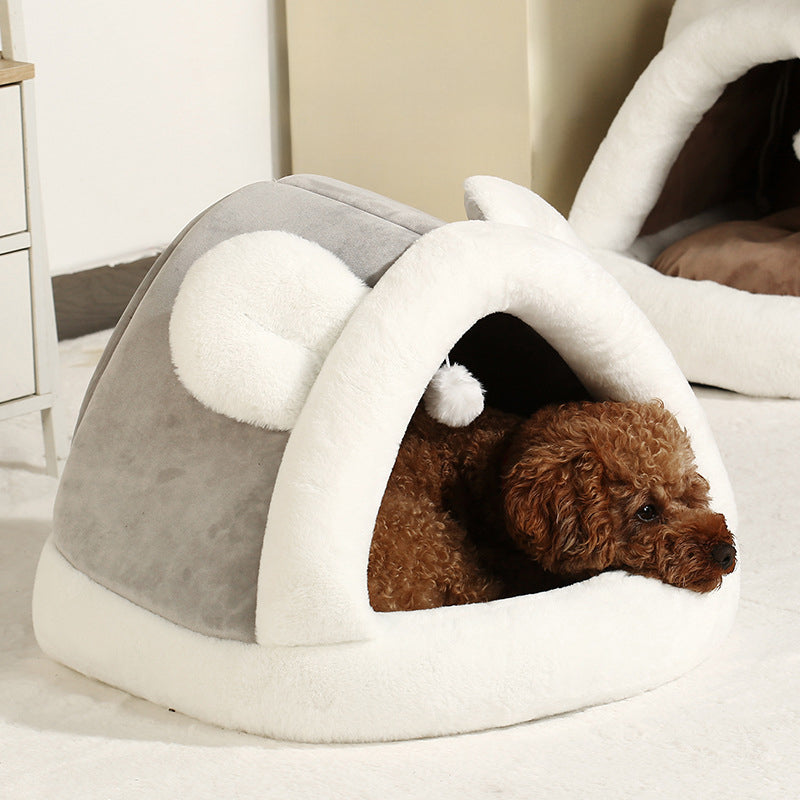 Self-warming cat cave bed ideal for small dogs and cats providing warmth, comfort, and a secure resting place.