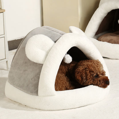 Self-warming cat cave bed ideal for small dogs and cats providing warmth, comfort, and a secure resting place.