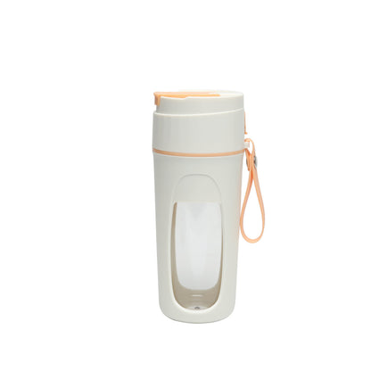 Portable USB Blender Cup for Smoothies & Juices with stylish design and pomegranate background.