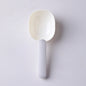  Pet food scoop designed for measuring and serving pet food, featuring a blue handle and a white scoop.