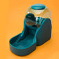 Automatic pet water fountain in teal color, designed for pets to enjoy water effortlessly.