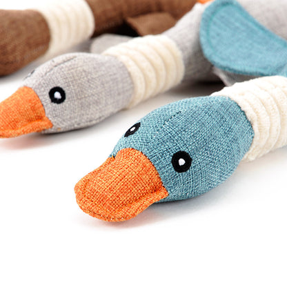 Interactive plush squeaky dog toy featuring colorful duck designs for fun and engaging playtime for dogs.