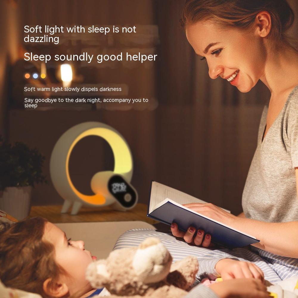Sunrise alarm clock Bluetooth speaker with unique circular design and digital display.