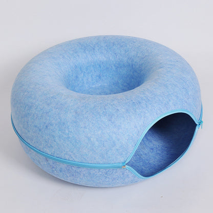 Two playful cats interacting with a 2-in-1 felt cat tunnel bed in stylish grey felt.