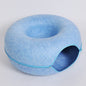 Two playful cats interacting with a 2-in-1 felt cat tunnel bed in stylish grey felt.