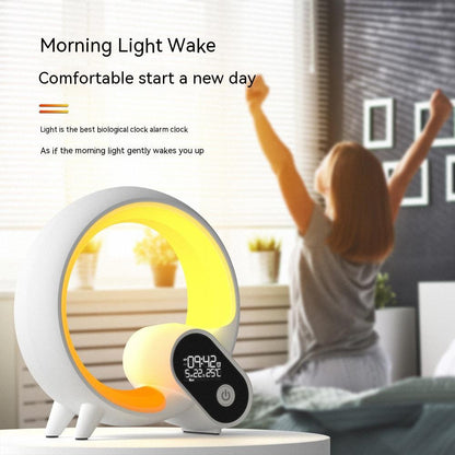Sunrise alarm clock Bluetooth speaker with unique circular design and digital display.