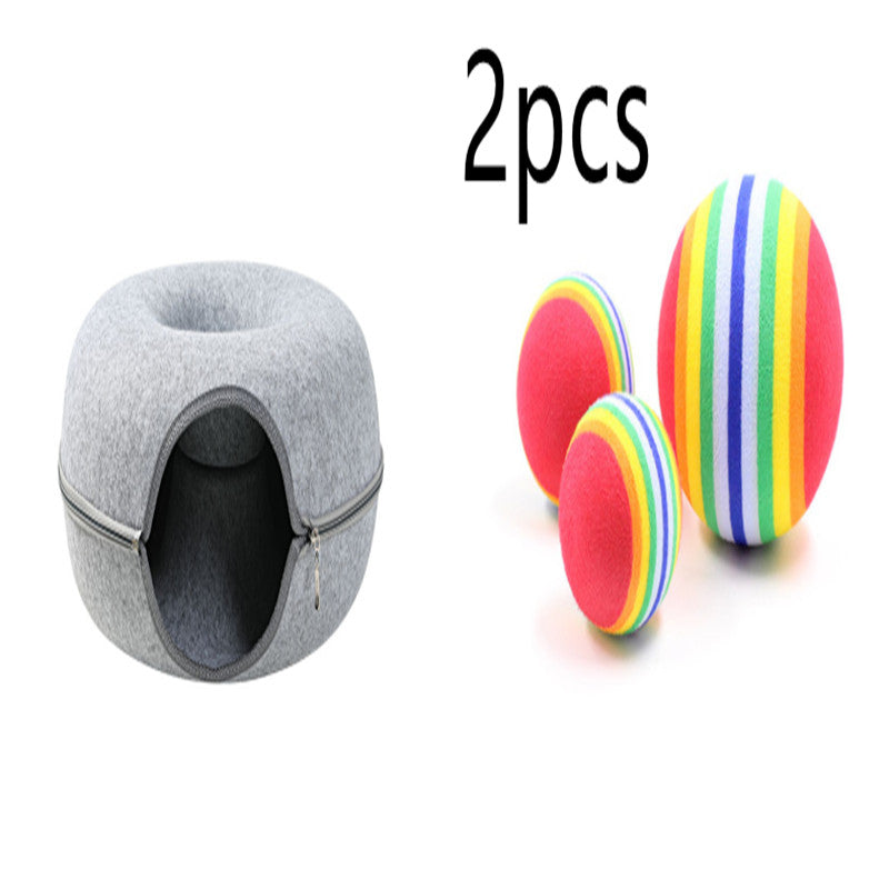 Two playful cats interacting with a 2-in-1 felt cat tunnel bed in stylish grey felt.
