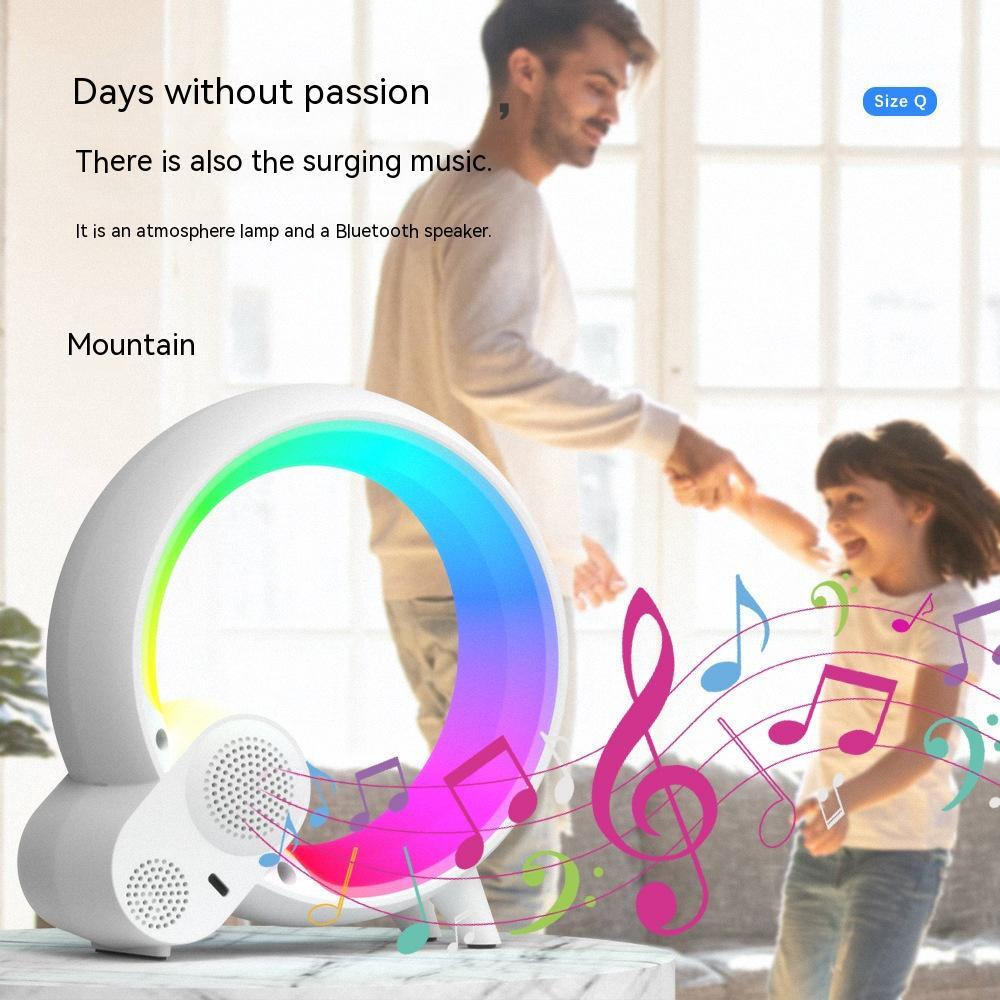 Sunrise alarm clock Bluetooth speaker with unique circular design and digital display.