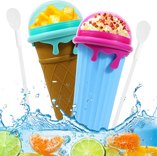 Two large capacity slushy cups with colorful lids and toppings, surrounded by fresh citrus slices and water splash.