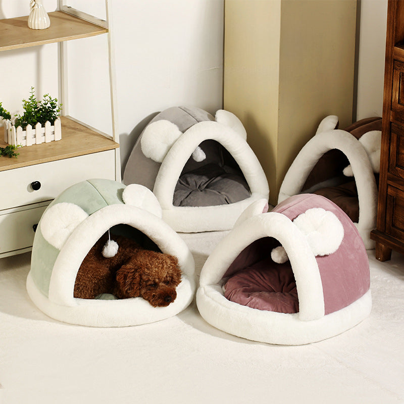 self-warming cat cave bed featuring cozy tent design for small dogs and cats, ideal for warmth and comfort.
