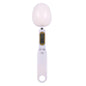 LCD digital kitchen scale with LCD display showing internal mechanism and removable battery cover.