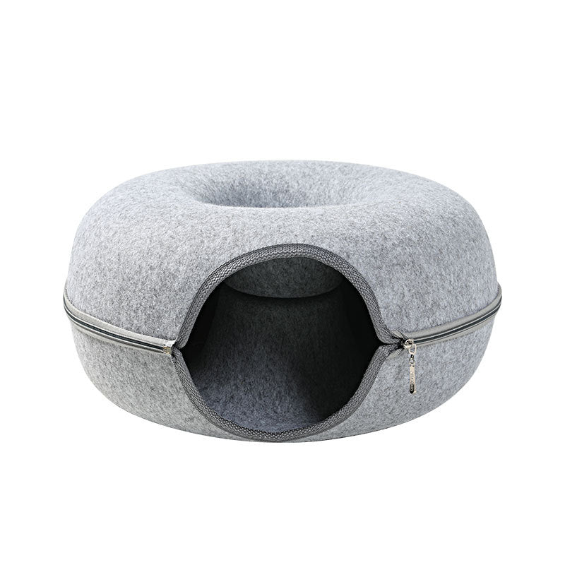 Two playful cats interacting with a 2-in-1 felt cat tunnel bed in stylish grey felt.