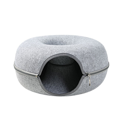 Two playful cats interacting with a 2-in-1 felt cat tunnel bed in stylish grey felt.