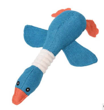 Interactive plush squeaky dog toy in the shape of a colorful bird for playful dogs.