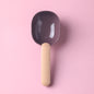  Pet food scoop designed for measuring and serving pet food, featuring a blue handle and a white scoop.