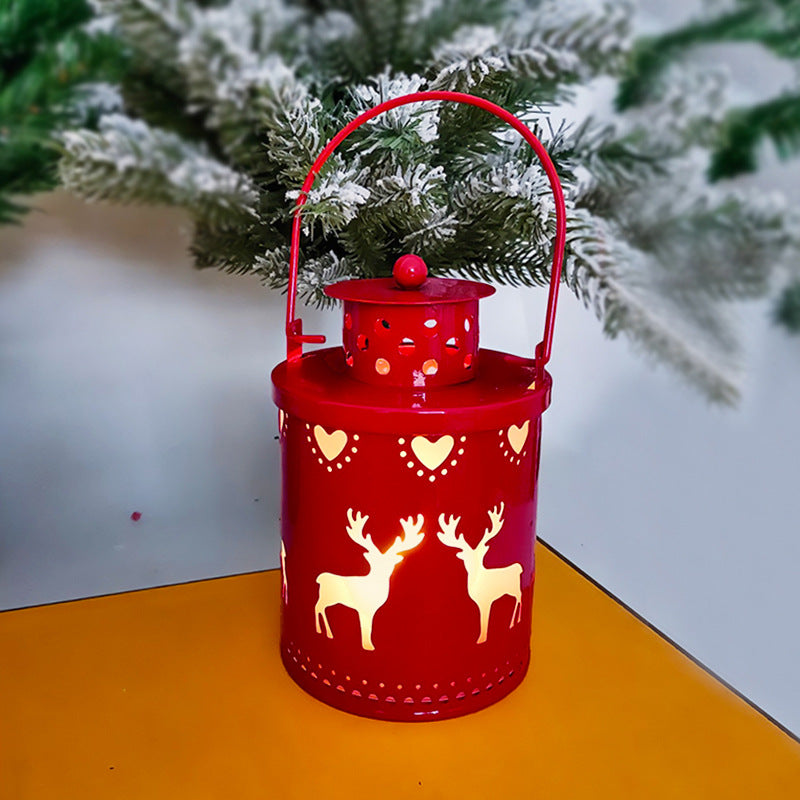 LED Christmas candle lantern featuring a red design with reindeer patterns, perfect for holiday decoration.