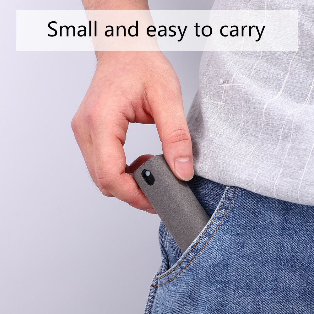 Portable mobile phone screen cleaner set in use, featuring microfiber wipe and cleaning fluid in a compact design.