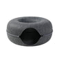 Two playful cats interacting with a 2-in-1 felt cat tunnel bed in stylish grey felt.