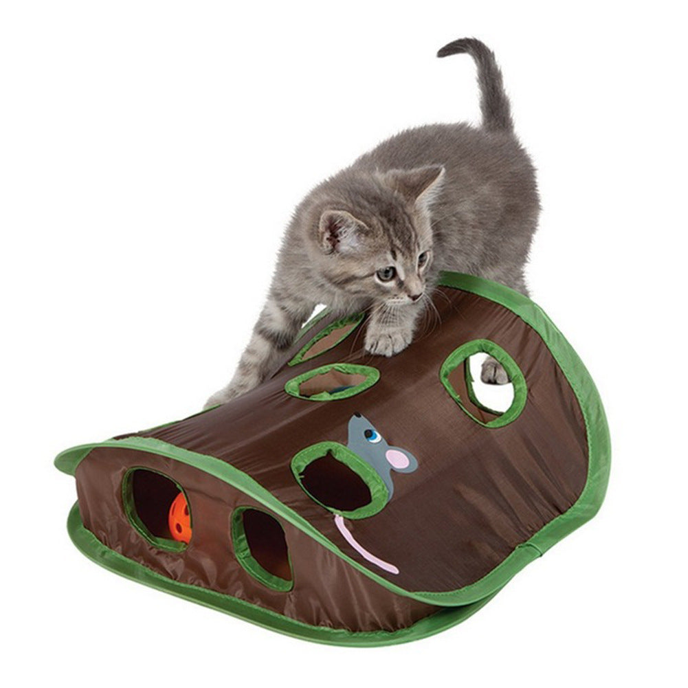 Interactive cat hide and seek toy with a playful kitten exploring the holes and balls inside.