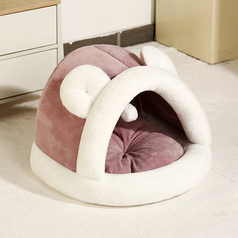 Self-warming cat cave bed with soft plush material, cozy tent design for small dogs and cats.