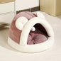Self-warming cat cave bed with soft plush material, cozy tent design for small dogs and cats.