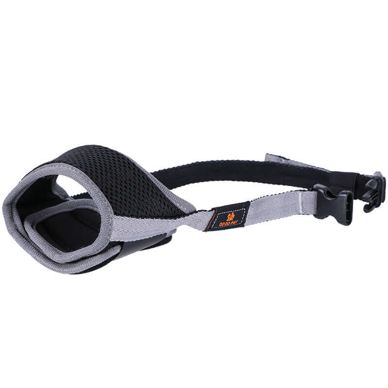 Adjustable dog muzzle designed for large Labrador dogs, featuring breathable mesh material for comfort.