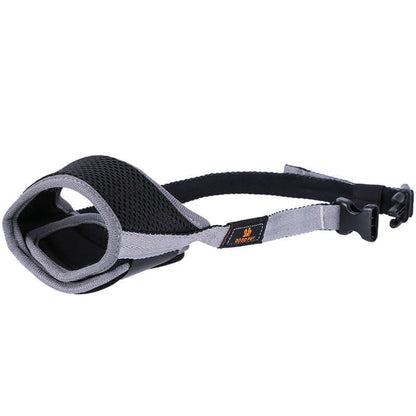 Adjustable dog muzzle designed for large Labrador dogs, featuring breathable mesh material for comfort.