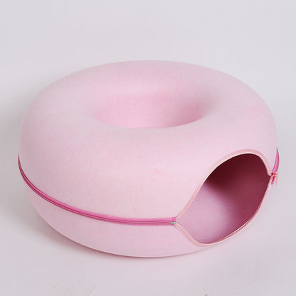 Two playful cats interacting with a 2-in-1 felt cat tunnel bed in stylish grey felt.