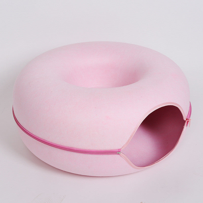 Two playful cats interacting with a 2-in-1 felt cat tunnel bed in stylish grey felt.