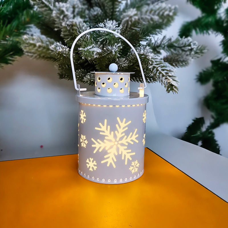 LED Christmas candle lantern with snowflake design, perfect holiday decoration for mantels and tables.