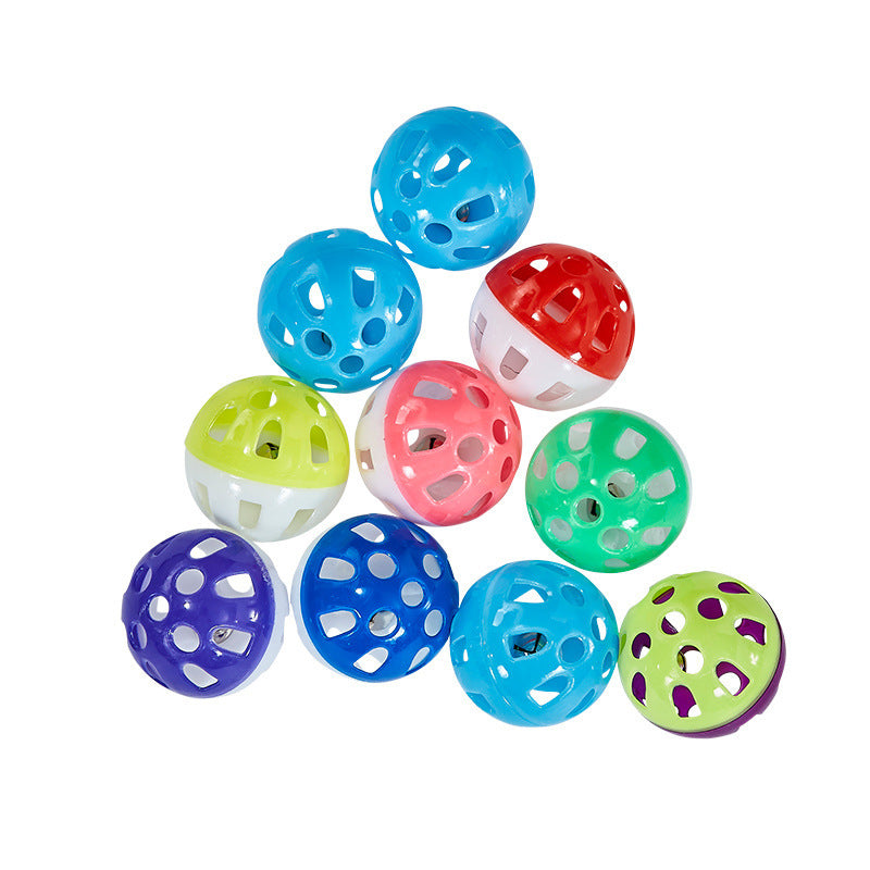 Colorful interactive bell cat toy balls stacked together for enticing cat play and engagement.